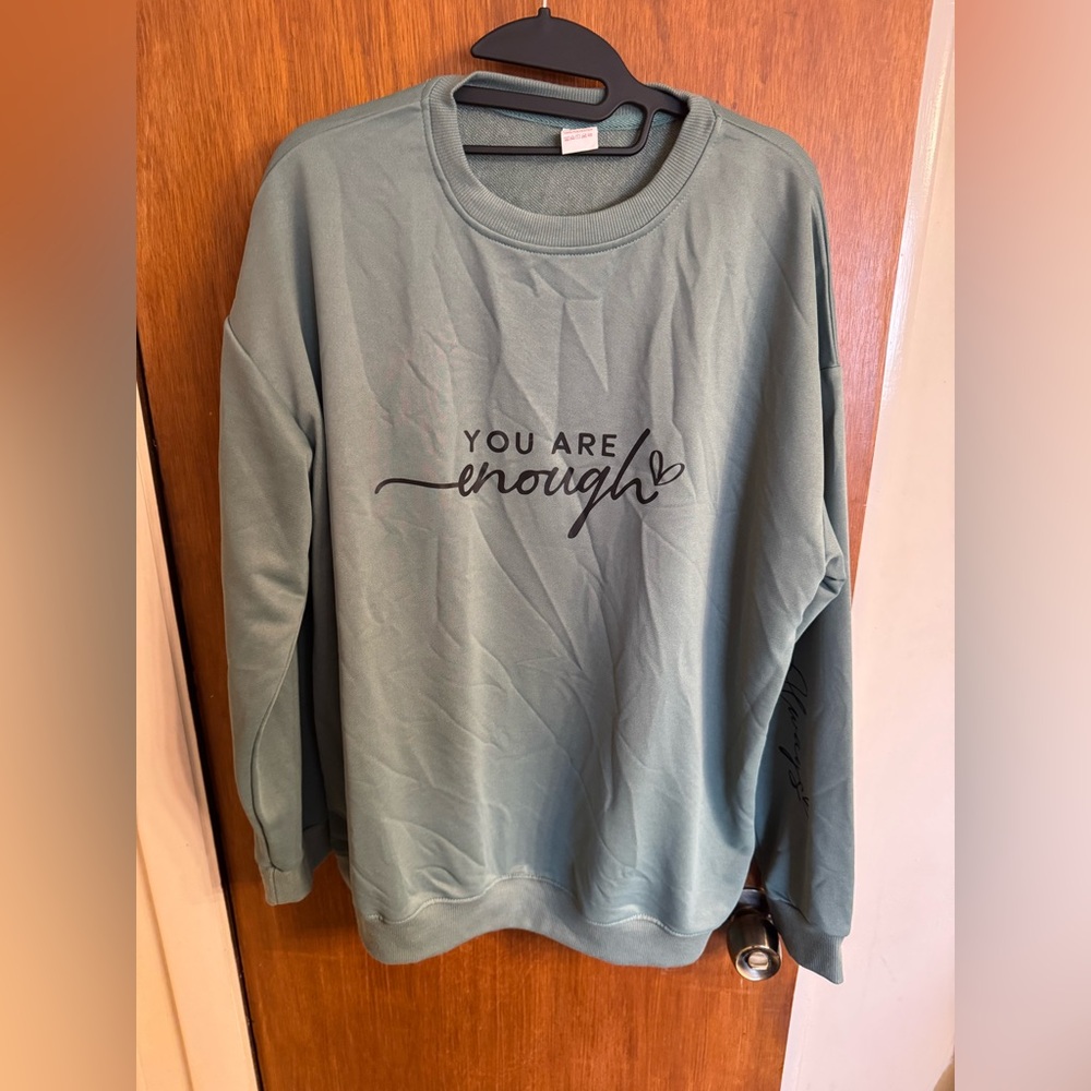 NWOT green graphic sweatshirt; front “you are enough 💚, sleeve “always 💚 ”, 1X